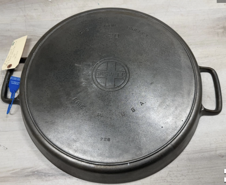 Bottom of Griswold number 20 "Hotel Skillet" large block logo EPU cast iron double-handed pan, pattern number 728. Sold for $900. 